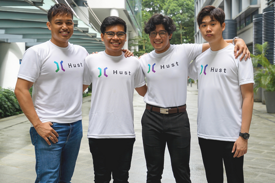 (second from left) Muaz Mustaffa, SUSS Venture Builder Programme participant and co-founder of Hust, together with his team.