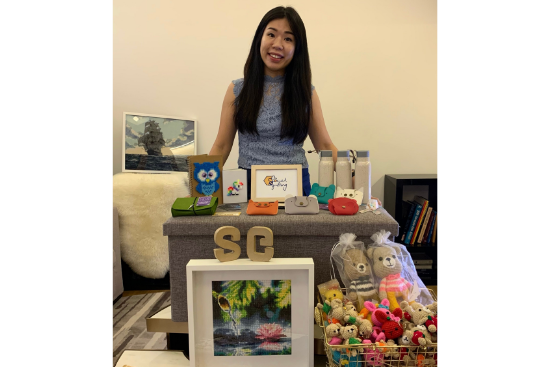 Founder of Social Gifting, Valen Tan, with some of the products that her company has produced as corporate gifts.