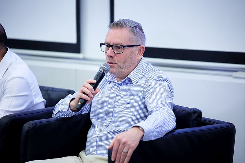 Mr Adrian Davis addressing audience question during the first panel discussion
