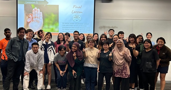 After five lessons, the participants huddle together for a group photo, with new knowledge gained.