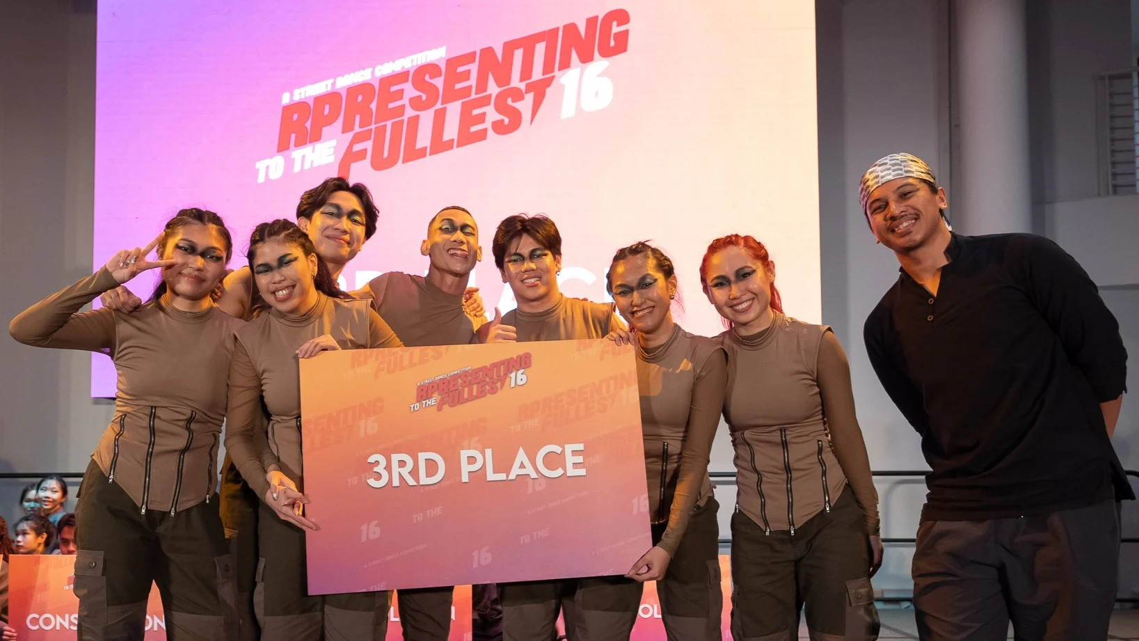 All smiles from members of the dance crew during the prize-giving ceremony.