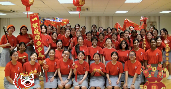 Cedar Girls’ School celebrates with a sing-along session together with attendees.