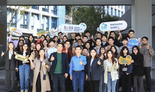 Group photo taken with He Jun