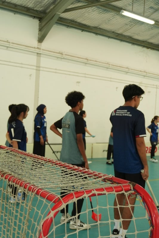 SUSS floorball team in action