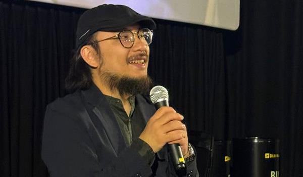 Lawrence Kan, director of In Broad Daylight speaking at the post-screening interaction session