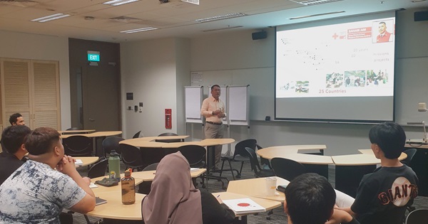 Mr Sahari Ani engages students with his own experiences in various countries.