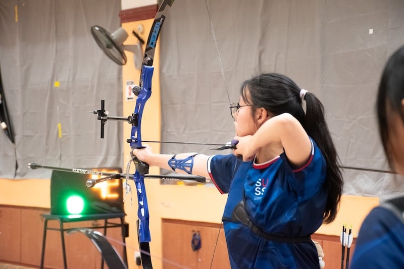 Claudia staying focused on every shot- determined to hit the bullseye