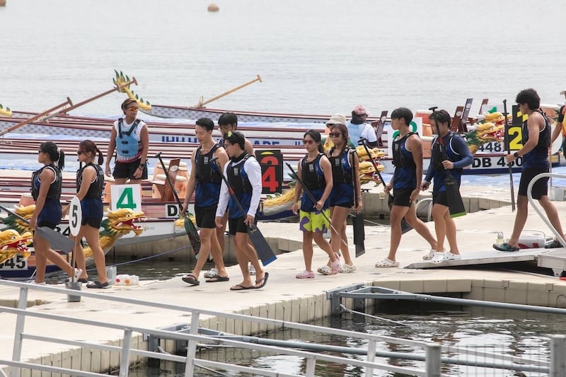 3. Dragon Boat Team loading up the boat before the Tertiary Mixed 500m race