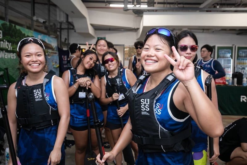 4. Dragon Boat Team warming up in the water