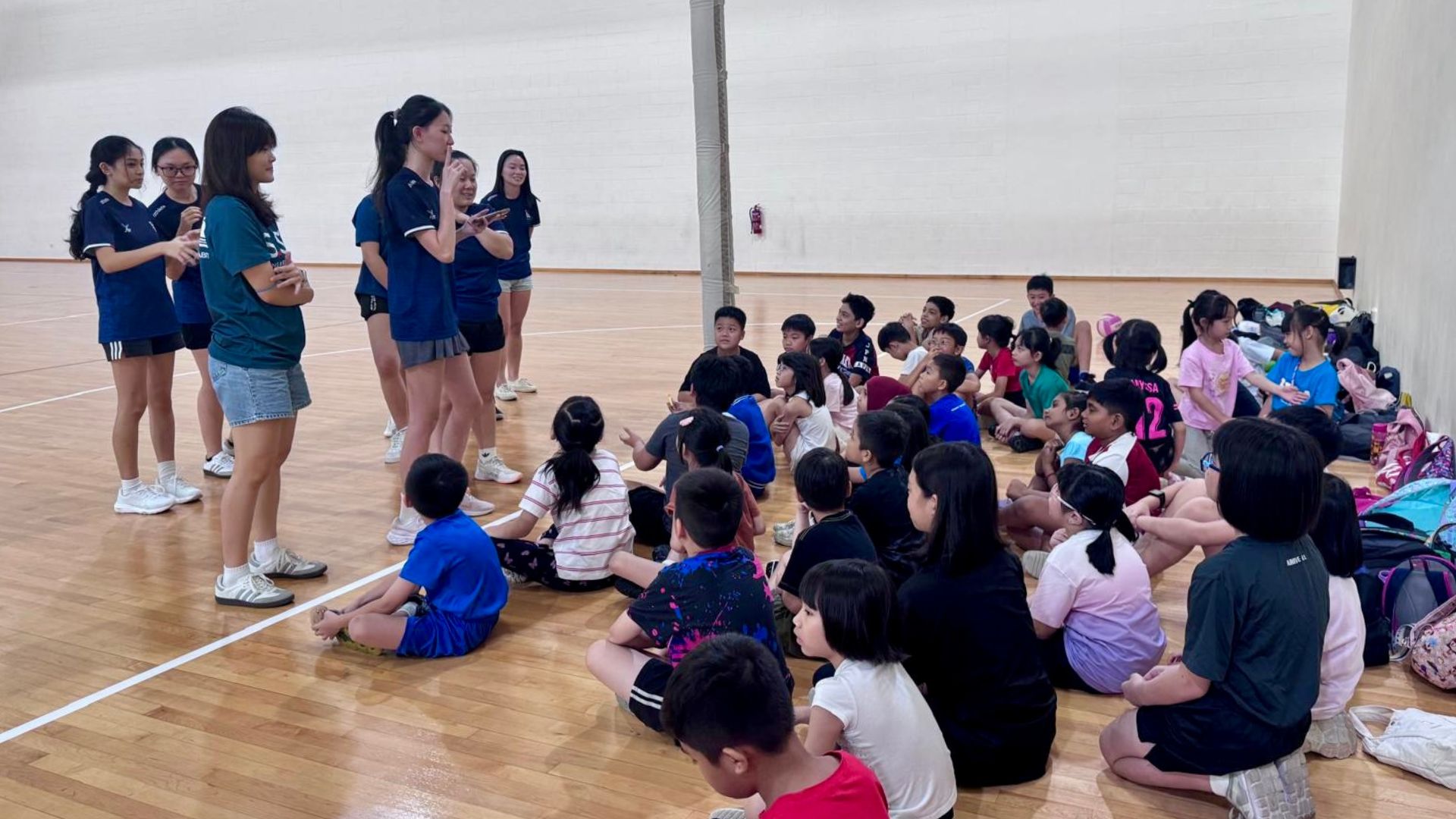 A room full of eager faces ready to learn and play.