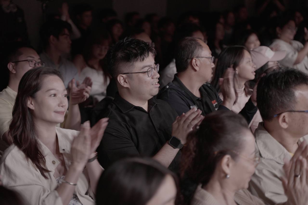 An enthusiastic crowd fills the concert hall with energy and applause at Cantabile 2025, cheering on every performance with unwavering support.