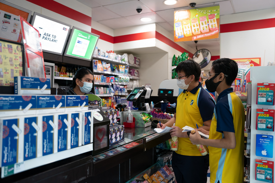 A Crest student interviewing a shopkeeper to understand more about their assets within the community. A Crest student interviewing a shopkeeper to understand more about their assets within the community.