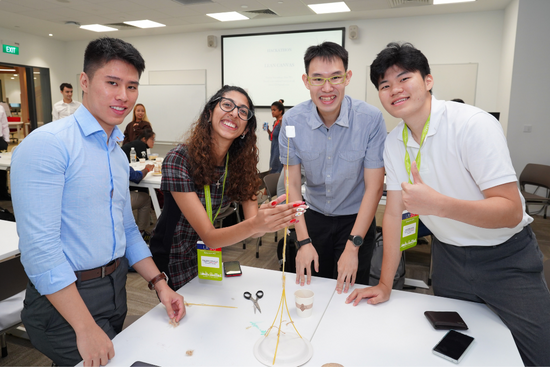 Brian Joseph Ng Jun Heng (left), together with participants of the UKSAEI Hackathon. Brian Joseph Ng Jun Heng (left), together with participants of the UKSAEI Hackathon.