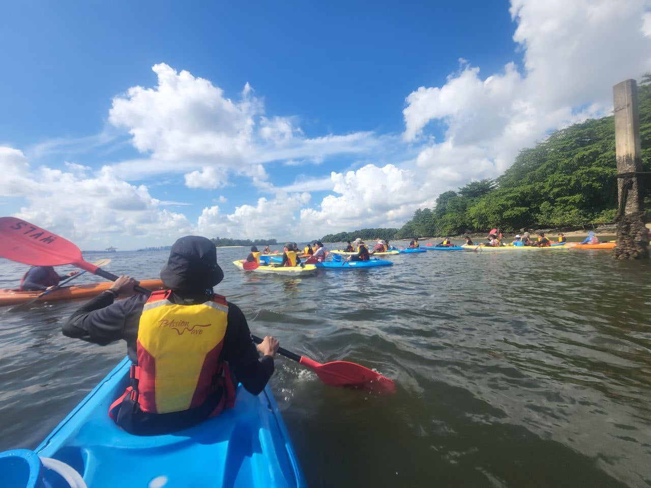 Kayaking together out at sea Kayaking together out at sea