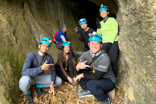 Students exploring the caves of Ha Long.