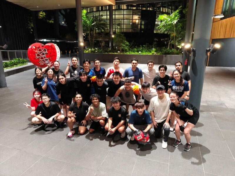 Group Photo of SUSS, SMU and SIM Boxing Members at SMU Campus after the Joint Training Session