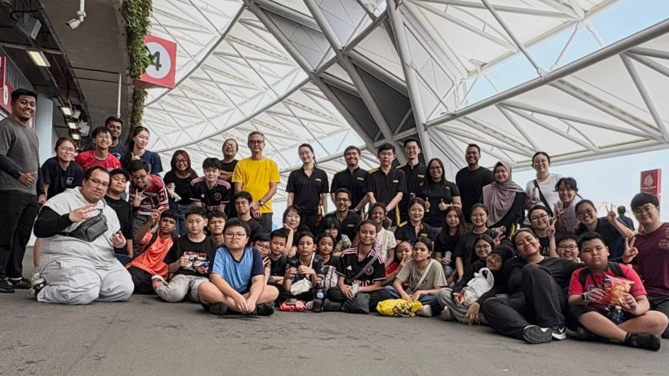 The entire camp community of children, volunteers, and the Red Cross team comes together for a group photo at the end of Day 1, celebrating a day of connection, laughter, and meaningful moments