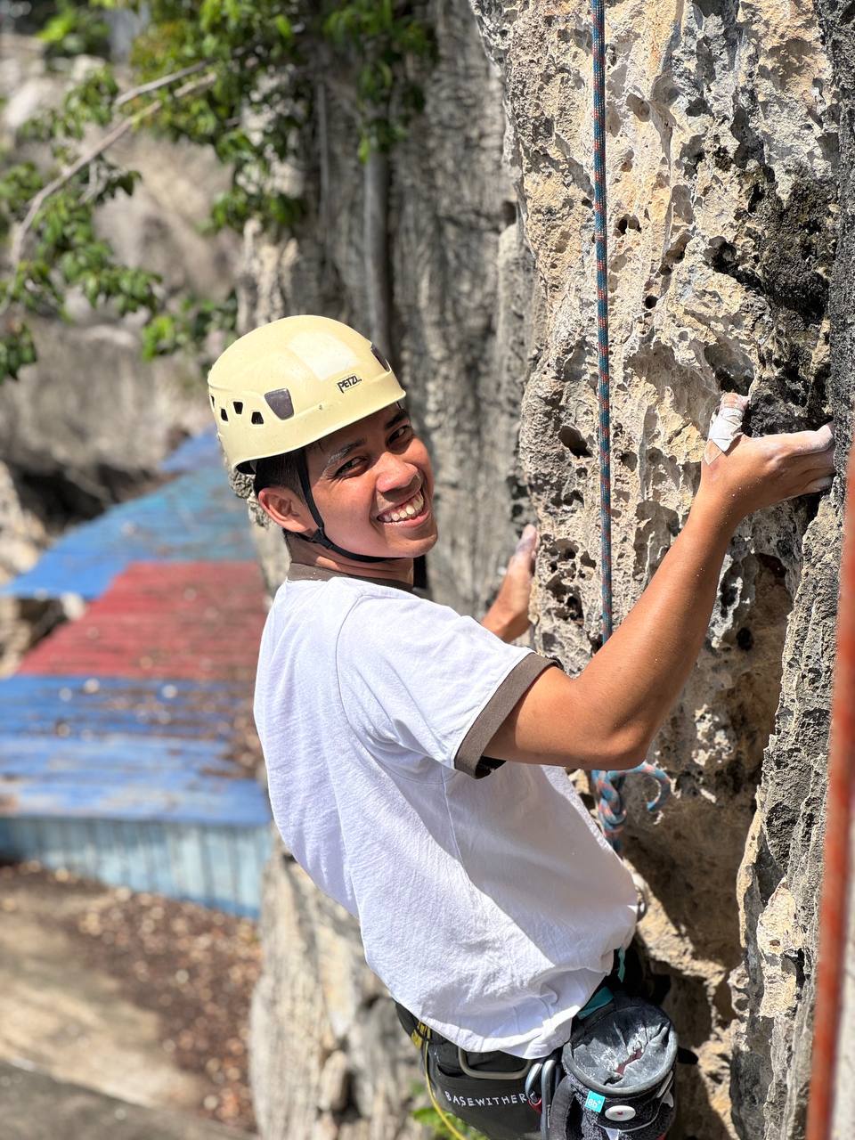 Ho Zachary (Year 1, Human Resource Management student) descending with a smile after a rewarding climb at Gua Damai