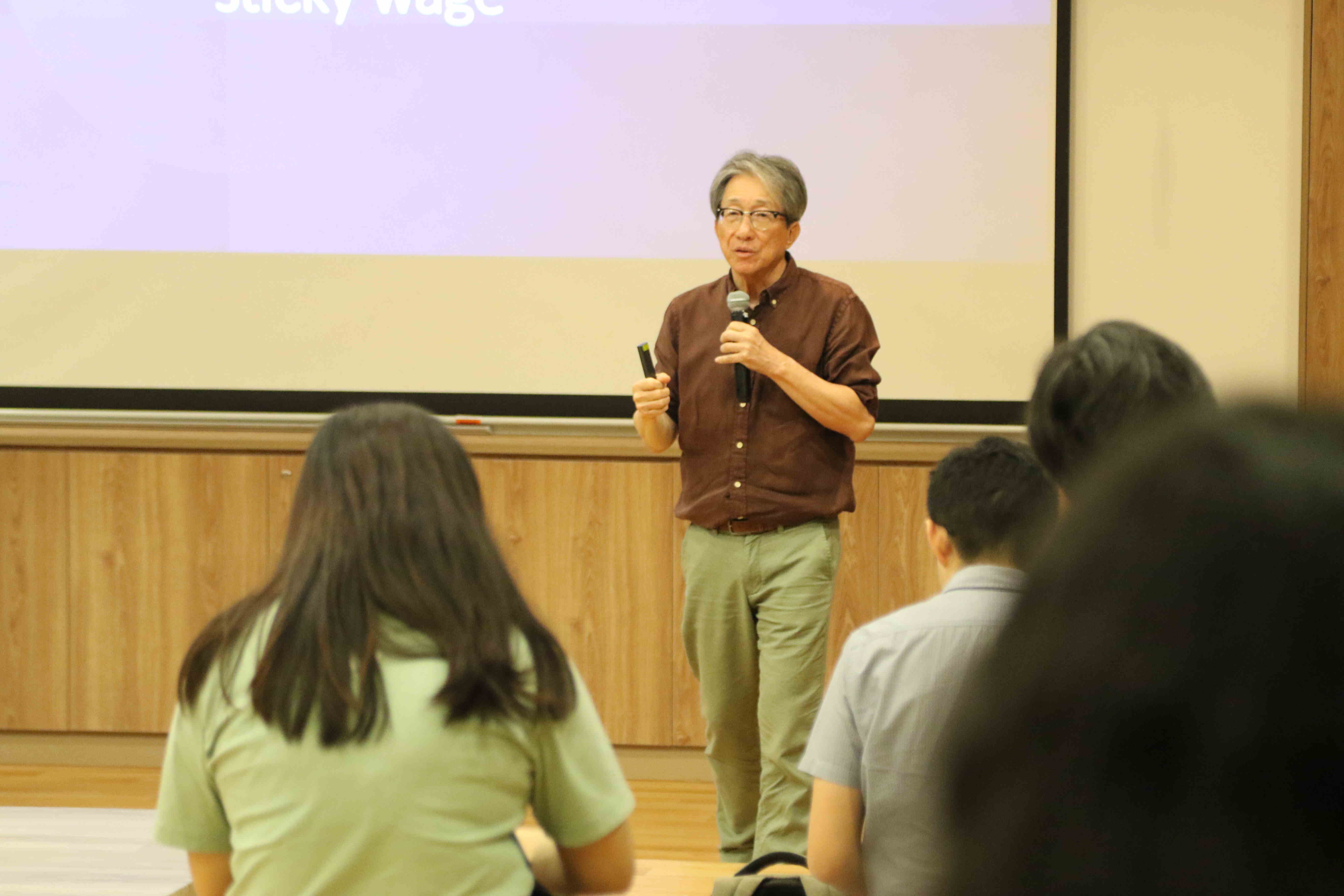 Person giving a presentation with an audience