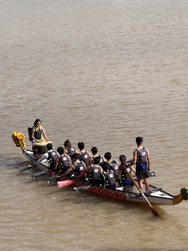 SUSS Dragon Boat Team focused and preparing to launch for the 100m event.