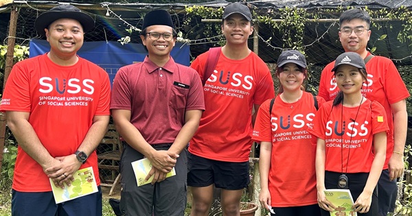 SUSS facilitators strike a pose at a garden in Pulau Ubin.