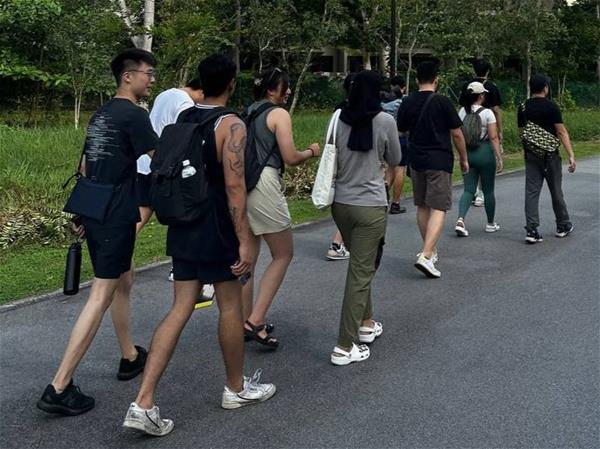 SUSS Students on a recce trip to find suitable routes for CCF youths.