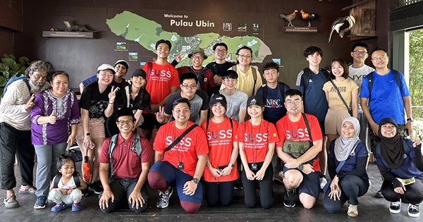 The facilitators and participants pose for a final group photo to remember a day of fun before disembarking for Singapore.
