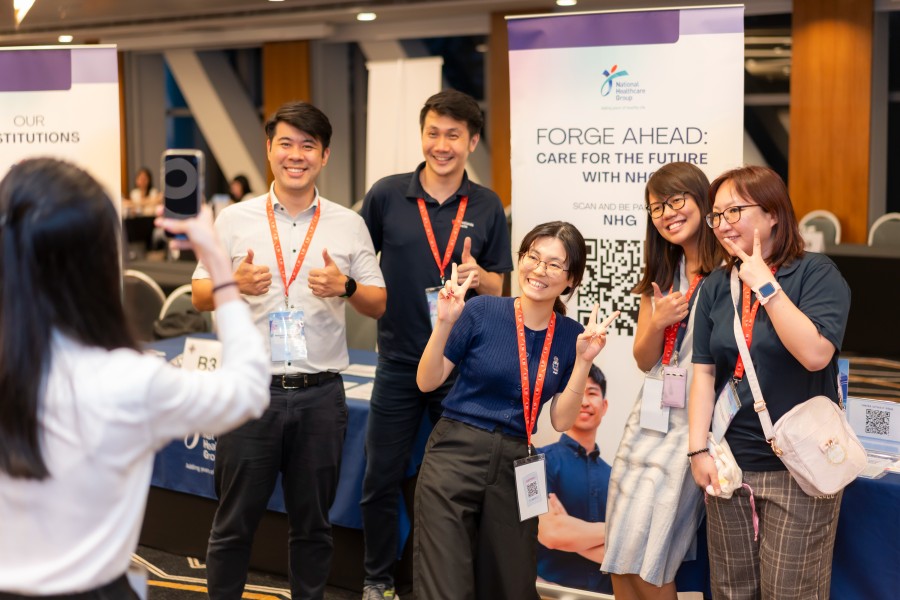 Group photo of National Healthcare Group staff at SUSS career outreach event