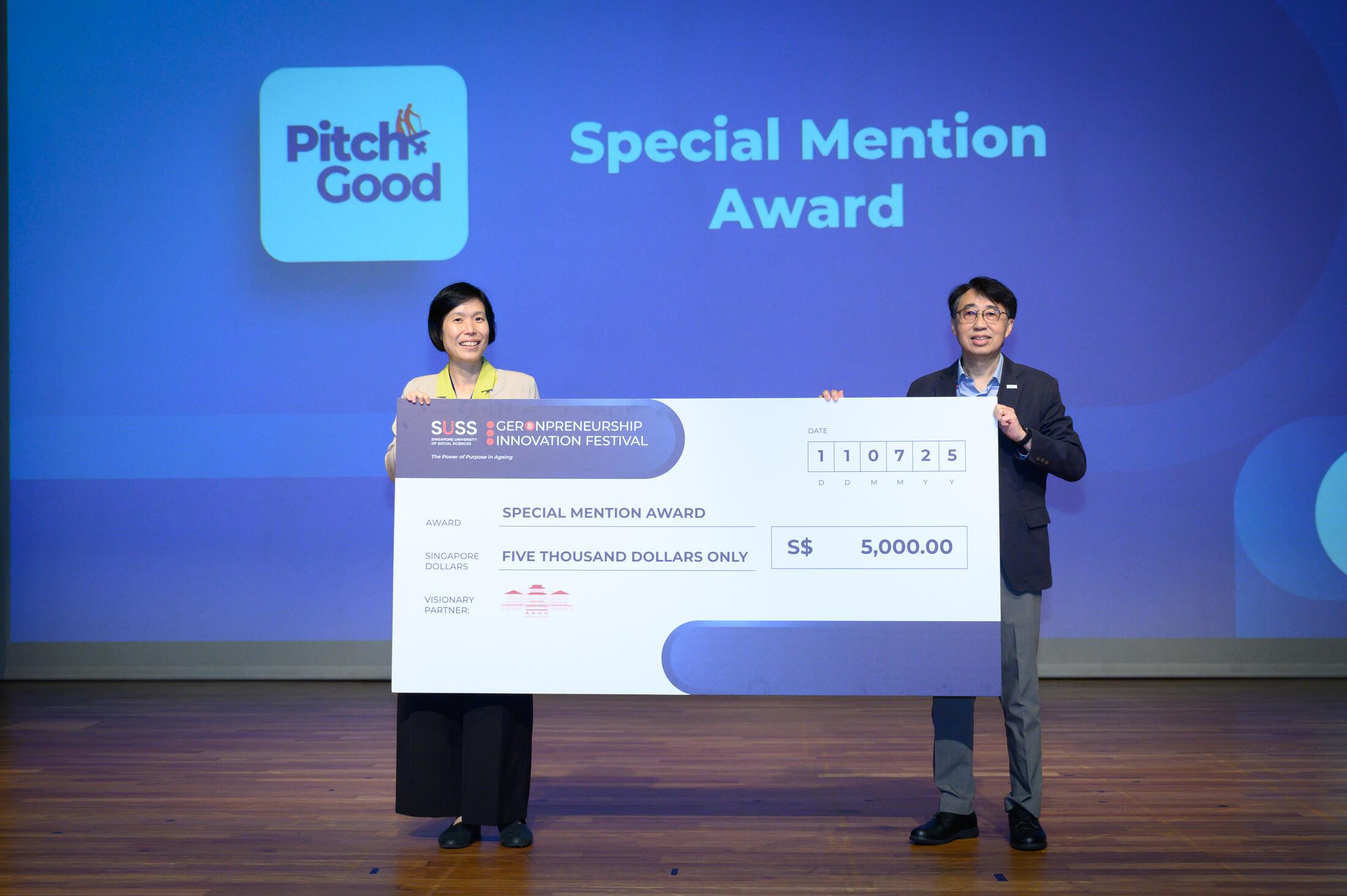 Winning startup MIEA Health receiving the Pitch for Good award on stage