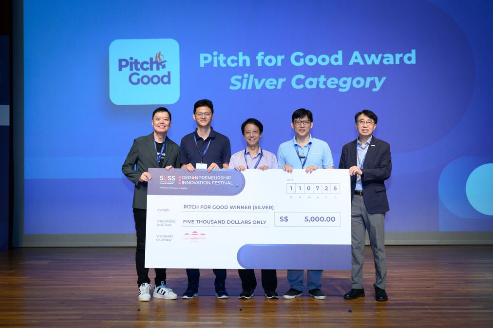 Winning startup Sentinan receiving the Pitch for Good award on stage