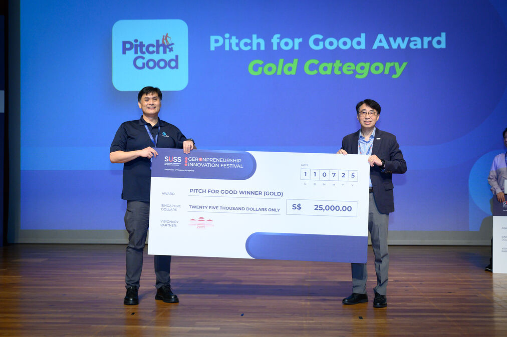 Winning startup Soundeye receiving the Pitch for Good award on stage