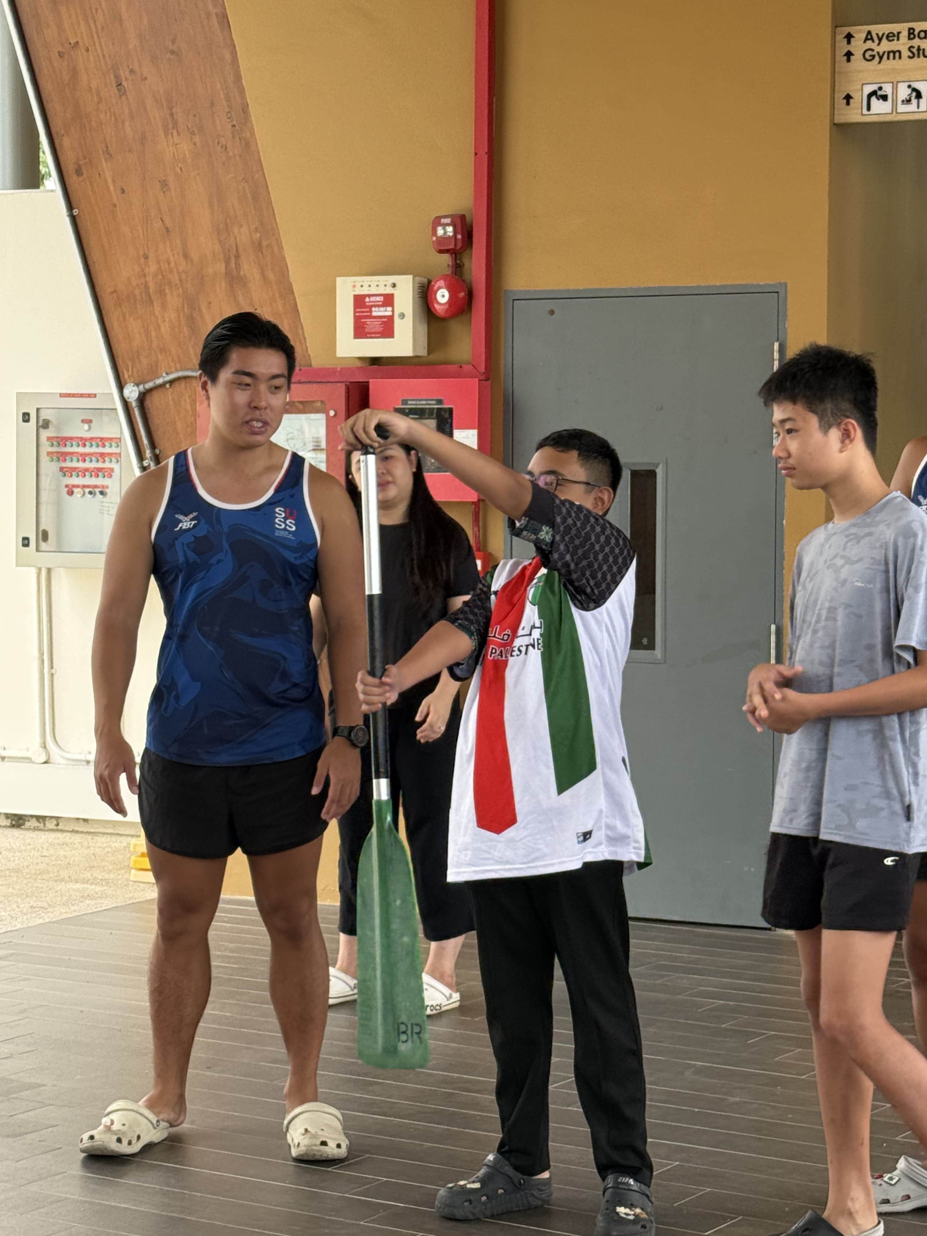 Participants learning paddle-grip
